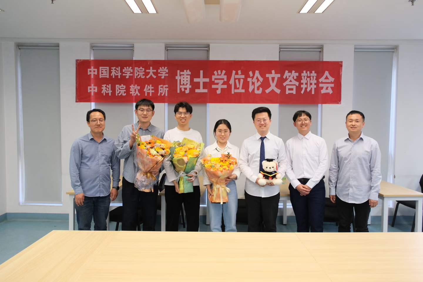 Group photo after the defense